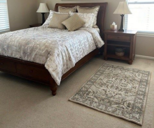 Karastan area rug in a bedroom